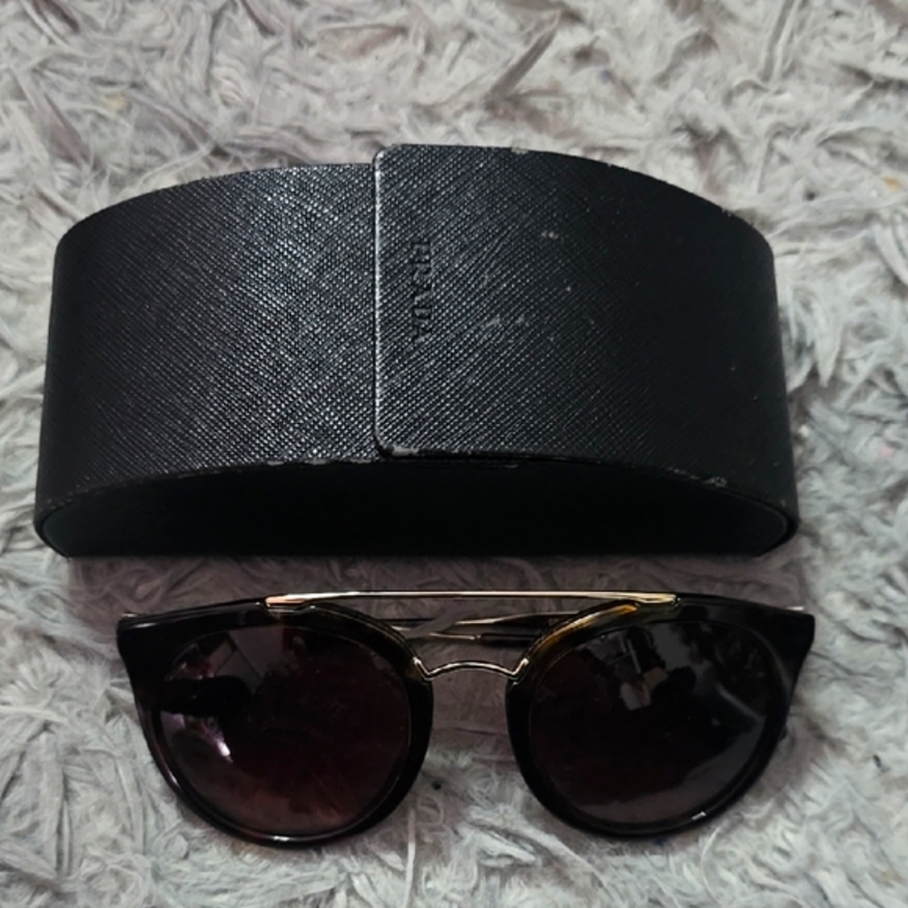 Prada Black and Gold Round Sunglasses